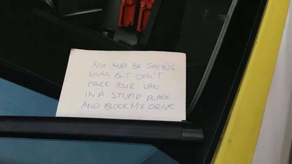 image for 'Don't block my drive' note left on ambulance