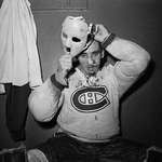 image for Jacques Plante, 1959: After getting hit in the face with a puck three minutes into a game, Plante went for repairs and later returned in the same game wearing a mask, becoming the first NHL Goalie to do so
