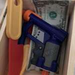 image for Found out my three year old daughter keeps a box with a knife, a gun, and some cash. Should I be worried?