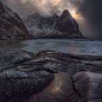 image for Kvalvika beach opens its jaws... One of the most dramatic light I have witnessed appeared between numerous snow and rain storms. Lofoten islands always deliver! Kvalvika - Lofoten - Norway [OC] [960x640]