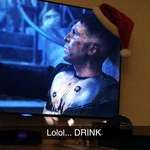 image for Every year I put a Santa hat on my TV and play this drinking game. If someone wears the hat, you drink. I'd say it's close enough