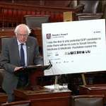 image for Senator Bernie Sanders printed out a gigantic Trump tweet and brought it to congress