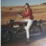 image for My grandmother as a teenager, posing on a motorcycle- 1960’s