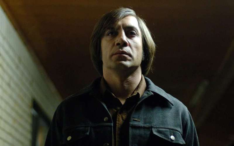 image for Why Anton Chigurh is still an iconic movie villain, 10 years later