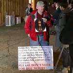 image for this man outside Roy Moore's rally in Alabama