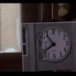 image for Back to The Future - The opening credits have a clock foreshadowing Doc hanging off the city clock