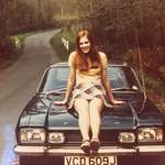 image for My mum in 1969 posing on her first car at age 17!