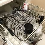 image for I use an upside down metal dish rack to keep my Tupperware from flipping upside down in the dishwasher.