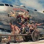 image for Captain “Waddy” Young and crew pose in front of their caricatures on their B-29 Superfortress on Nov 24, 1944
