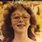 image for Curly hair doesn’t ‘feather’ like Farrah’s did. Also I miss that neck. Ahh the early 80s...