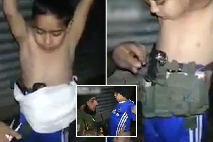 image for Iraqi soldier disarms 7-year-old boy after ISIS strap him with suicide belt
