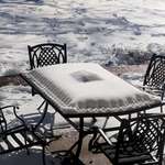 image for The snow on this patio table looks like a pastry pie