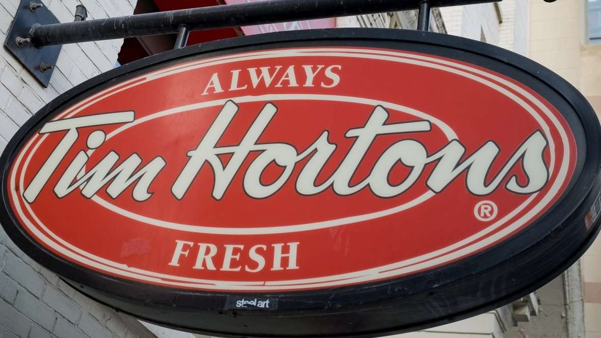 image for Tim Hortons franchise owners tell workers to blame Wynne for benefit cuts and to 'not vote Liberal'