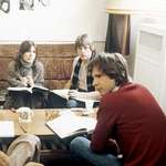 image for Carrie Fisher, Mark Hamill, and Harrison Ford going over the script for The Empire Strikes Back in 1979