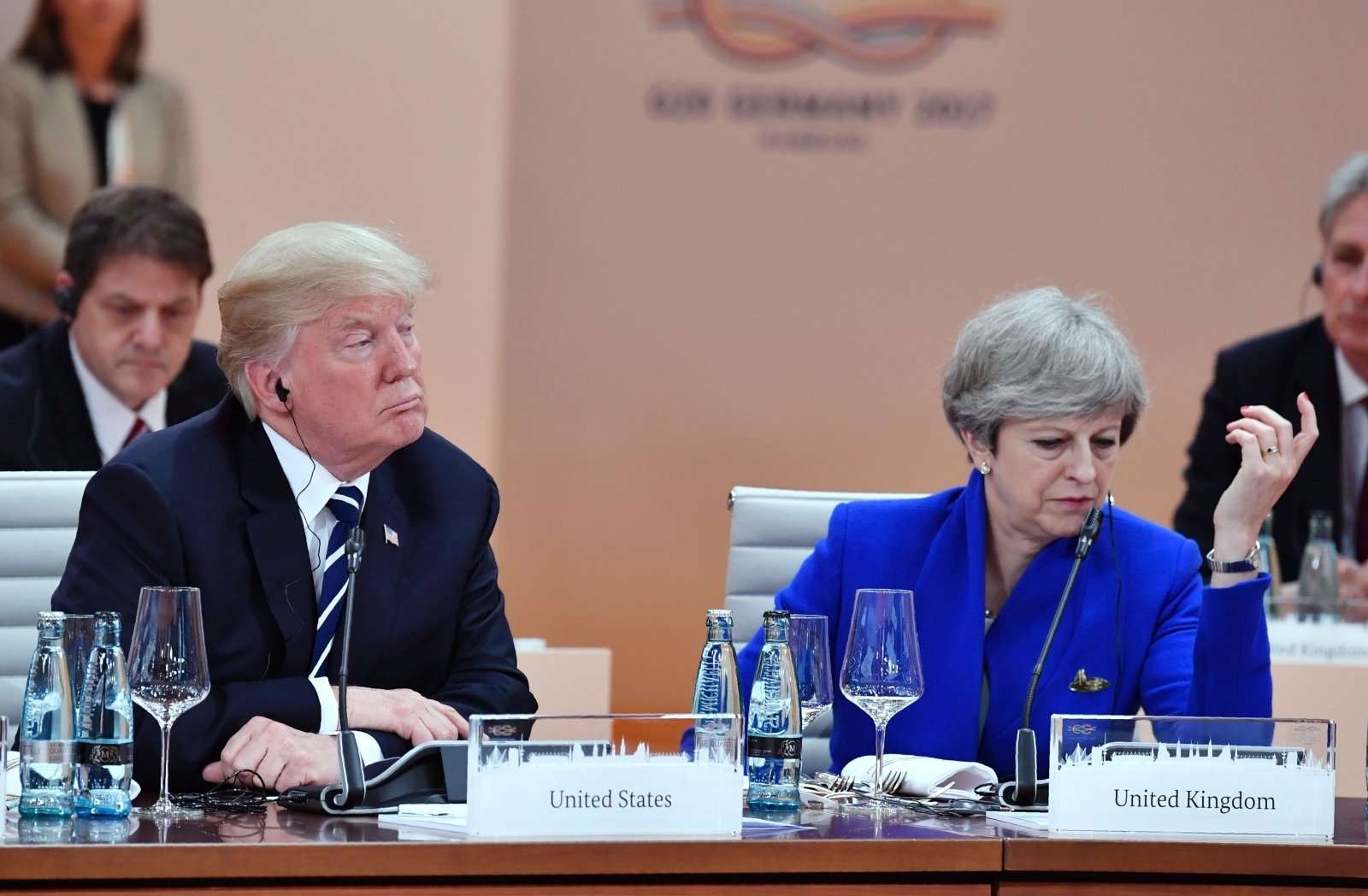 image for Donald Trump tells Theresa May he won't visit the UK unless she bans protests