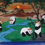 image for Local Mexican restaurant used to be a Chinese restaurant. Instead of painting over a mural, they just put sombreros on the pandas.