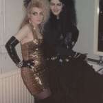 image for My 18th birthday. I'm the Goth. Still great friends with the beautiful girl next to me. :)