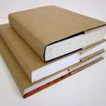 image for Covering your text books with brown paper.