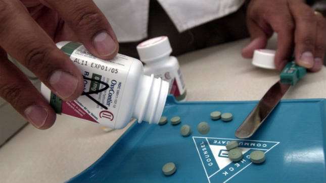 image for OxyContin maker will stop marketing opioid products to doctors amid scrutiny