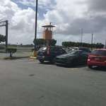image for Instead of a security camera, this Walmart parking lot in Puerto Rico has a security guard watch tower.