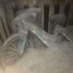image for Iced over bicycle after winter storm in Chicago.