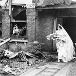 image for Bride leaving her recently bombed home to get married, London, Nov 4 1940