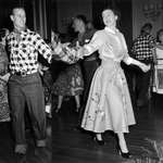 image for Princess Elizabeth, in peasant blouse and cotton skirt, and her husband, Prince Philip, in checkered shirt and blue jeans, enjoy an old-fashioned hoedown at a private party in Ottawa, Canada, October 11, 1951 [1213 x 997]