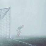 image for Goalkeeper Sam Bartram, alone on the pitch, not realizing that the game had been abandoned 15 minutes earlier due to heavy fog - 25 dec 1937