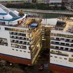 image for Rather than build a new cruise ship, Silversea has decided to cut their current ship in half with “military precision” and add another 50 feet of space right in the middle of the vessel. The project cost $100 million and took over 450,000 man hours to cut the 36,000 ton ship in half.