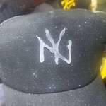 image for I present you the pinnacle of Shanghai markets, a hot glue NY Yankees hat.