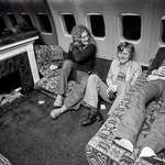 image for Led Zeppelin in their private jet 'The Starship'. It has a functional fireplace in-built in it. 1975.