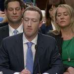 image for Facebook founder Mark Zuckerberg consulting his hive mind through telepathy (colorized, 2018)