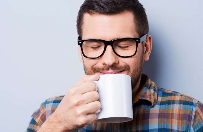 image for Coffee can help people have a more favorable view of their colleagues, according to new research