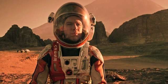 image for A former NASA scientist says 'The Martian' movie 'is completely doable.' But Elon Musk's city on Mars is another story.
