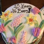image for Celebrated 15 years of sobriety. Sister surprised me with a cake. Loved it, though a flower cake for her brother was an interesting choice