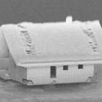 image for The world's smallest house - assembled inside a scanning electron microscope’s vacuum chamber, the house is just 20 micrometers long. It was built to test whether a robot could achieve nanometer accuracy in building.
