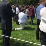 image for A man briefly taking a knee during the Whitehouse celebration due to the weight of his enormous balls