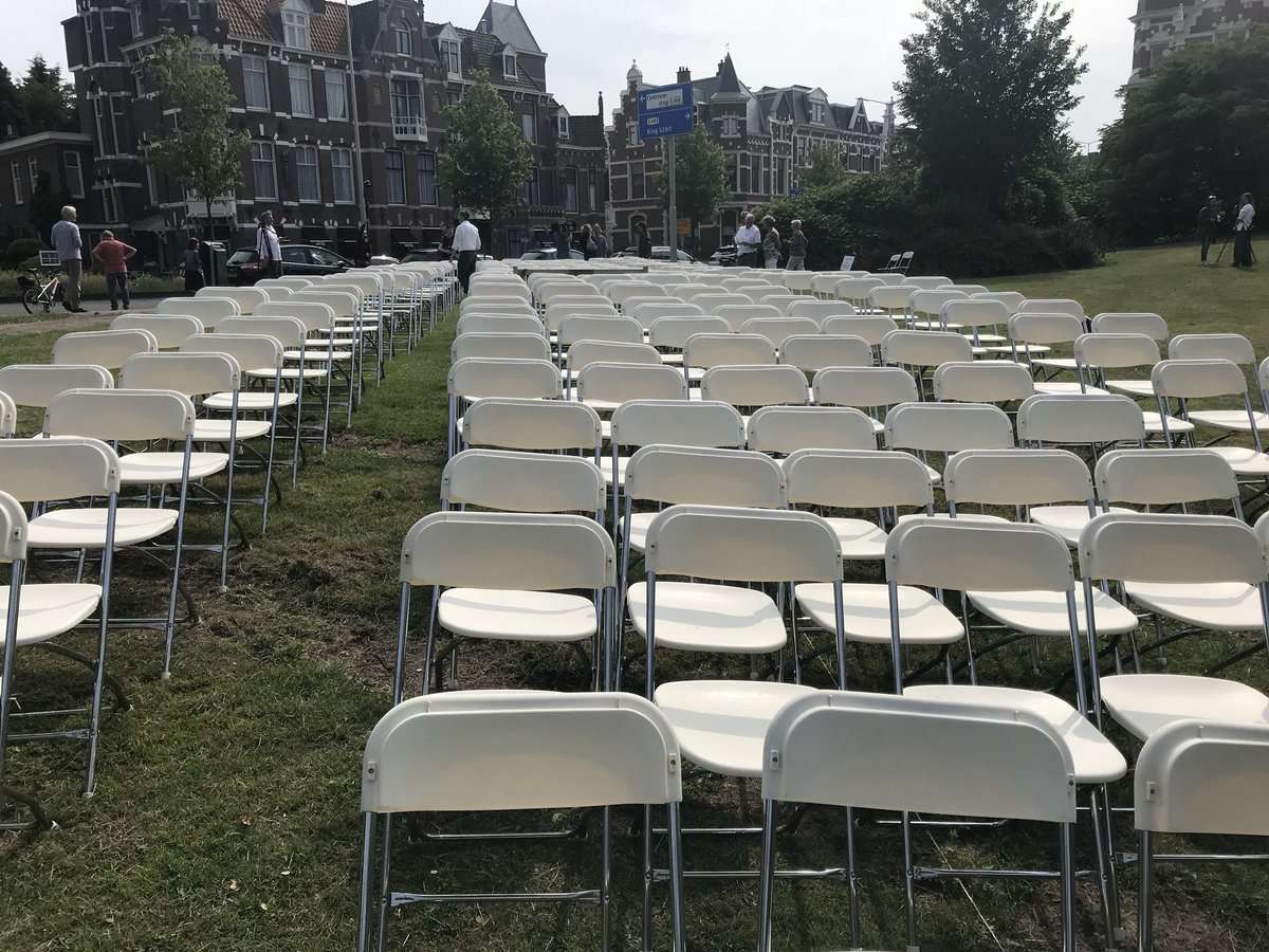image for 298 empty seats in front of the Russian embassy. A protest by a group of MH17 relatives