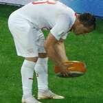 image for Swiss fans threw Shaqiri a wheel of cheese after his winning goal