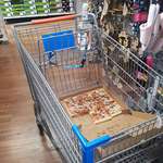image for Abandoned vodka and pizza in the Wal-Mart shoe isle