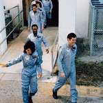 image for The crew of the Challenger, just before boarding, 28 January 1986