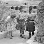 image for A curious Italian woman inspects the kilt of a Scottish soldier near the Coliseum after the liberation of Rome, 1944