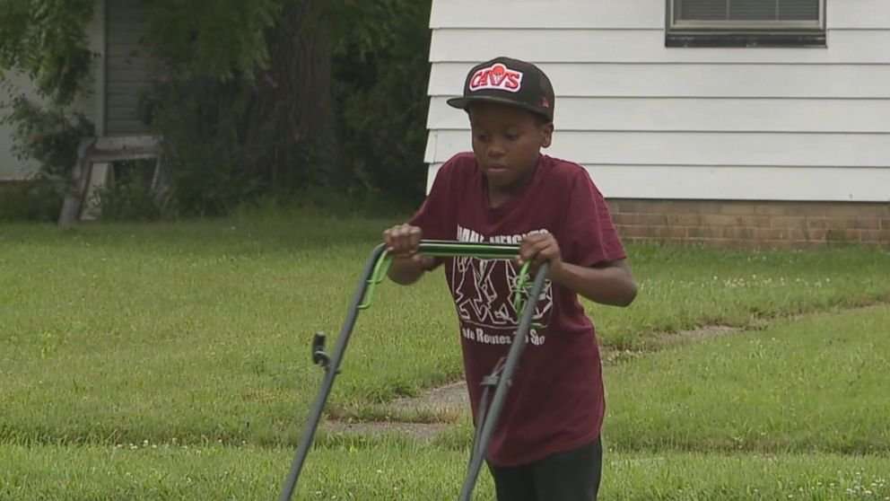 image for Neighbors who call police on 12-year-old mowing lawn increase his business, customer says