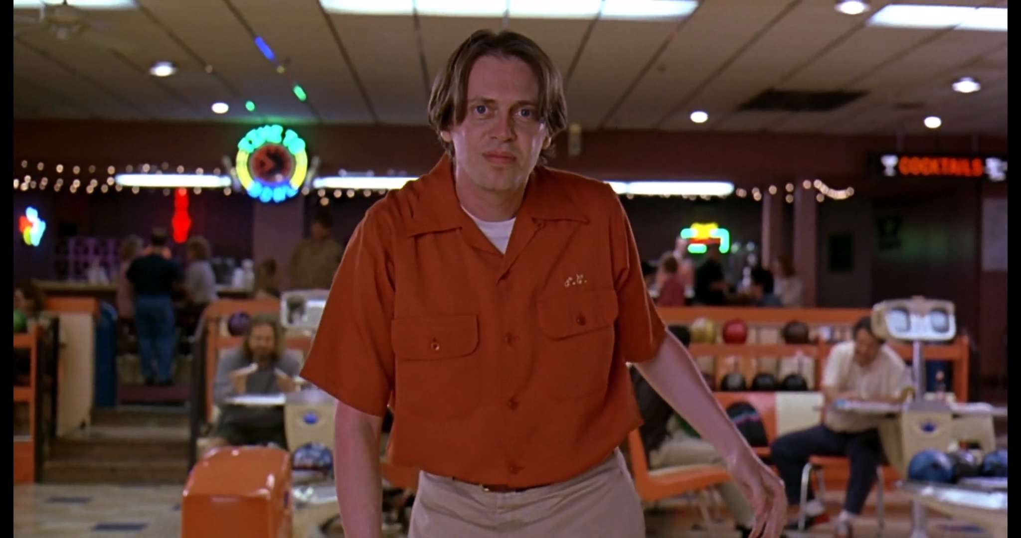 image for The Big Lebowski (1998) When Donnie bowls in the scene before he has his heart attack he does not hit a strike and proceeds to examine his arm, a symptom of an impending heart attack is discomfort in 