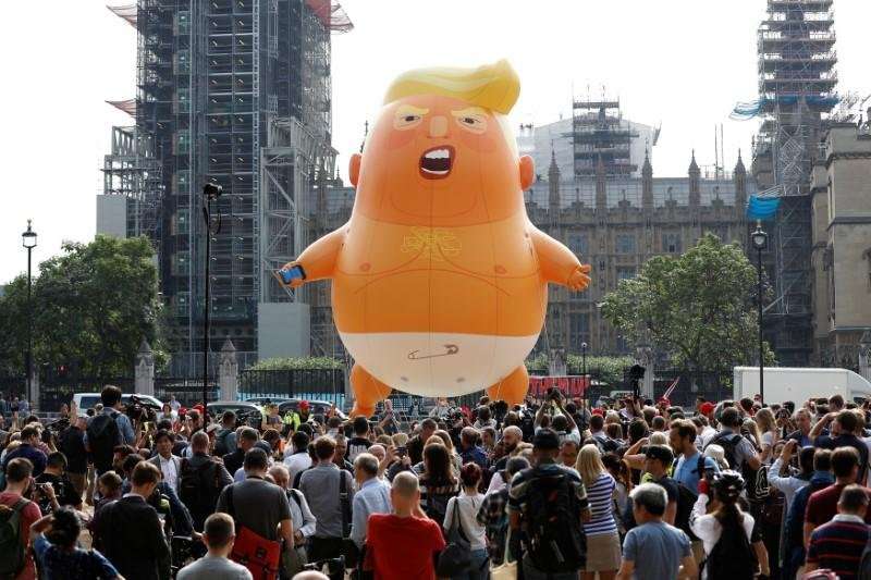 image for Snarling orange 'Trump baby' blimp flies outside British parliament