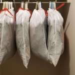 image for Use garbage bags to easily pack your hung clothing before moving.