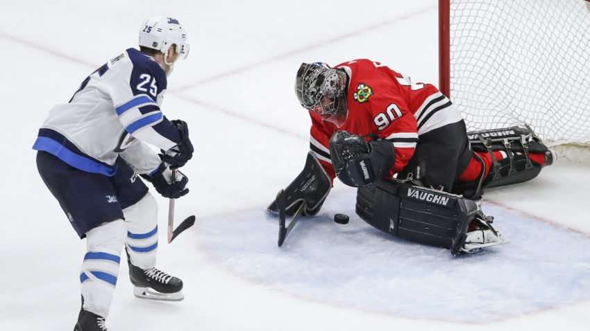 image for Blackhawks emergency goaltender — a 36-year-old accountant — stopped every shot he faced in NHL debut