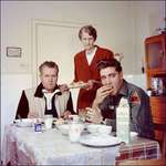 image for Elvis eating breakfeast with his family 1959