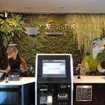image for A hotel in Tokyo has a reception desk that is run by robot dinosaurs