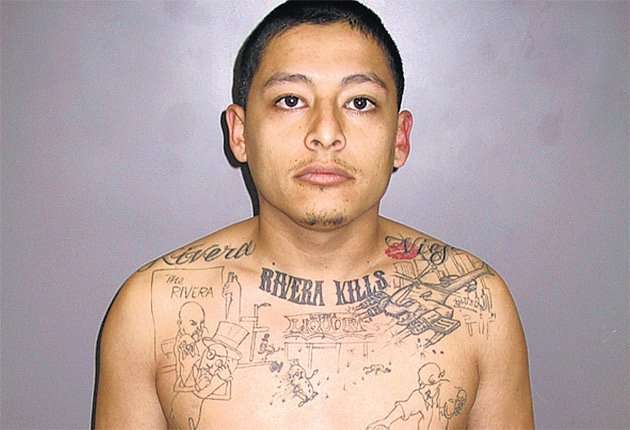 image for Boy with the crime-scene tattoo: Gang killer betrayed by body art